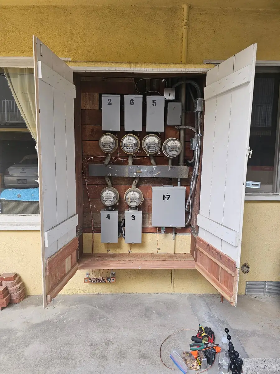 A dangerously old, corroded electrical panel — the kind AA Electrical Services replaces every week.
