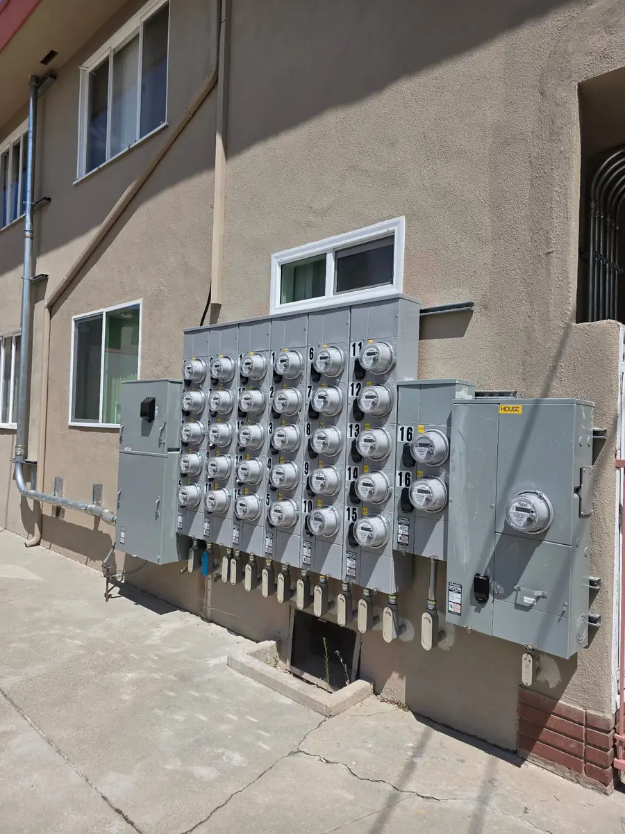 AA Electrical Services electrician installing a new panel in Los Angeles